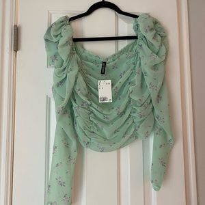 H&M ruffled puff sleeve floral top. Never worn